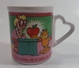 Enesco United Features Syndicate Jim Davis "Thanks for teaching me so good...er...well!" Garfield Giving Apple To Teacher Ceramic Coffee Mug with Heart Shaped Handle