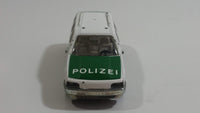 Siku No. 1076 VW Passat Variant GT Polizei Police Cop White and Green 1/55 Scale Die Cast Toy Car Rescue Emergency Vehicle with Opening Hatch Door