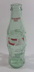 December 1993 Coca-Cola Classic Commemorative Santa Claus Christmas Themed 7 1/2" Tall 8 Fl oz. 237mL Glass Soda Pop Bottle