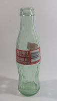 1999 Coca-Cola Classic '99 Winnipeg Pan American Games "The Spirit of Refreshment" 7 1/2" Tall 8 Fl oz. 237mL Glass Soda Pop Bottle