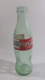 1999 Coca-Cola Classic '99 Winnipeg Pan American Games "The Spirit of Refreshment" 7 1/2" Tall 8 Fl oz. 237mL Glass Soda Pop Bottle