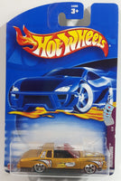 2002 Hot Wheels Trump Cars Montezooma Metalflake Gold Die Cast Toy Car Vehicle New in Package