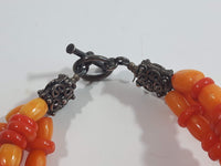 Three Layer Light Orange and Dark Orange Bead 2" Diameter Metal Locket Style Bar Clasp Bracelet