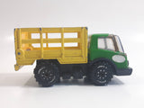 Vintage Tonka Farm Livestock Truck Green and Yellow Pressed Steel Toy Car Vehicle with Opening Rear Gate Made in Japan