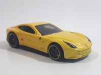 2014 Hot Wheels HW City - Speed Team Ferrari F12 Berlinetta Yellow Die Cast Toy Car Vehicle