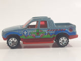 2004 Matchbox Medic Rescue Ford Explorer Sport Trac Pickup Truck Metalflake Light Blue Die Cast Toy Car Vehicle