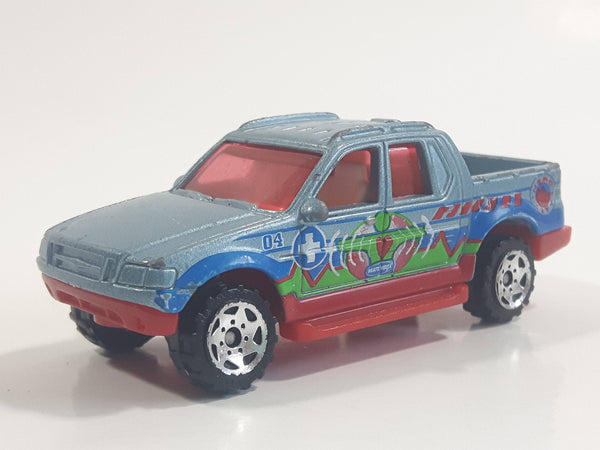 2004 Matchbox Medic Rescue Ford Explorer Sport Trac Pickup Truck Metalflake Light Blue Die Cast Toy Car Vehicle