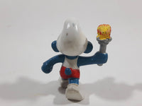 Vintage 1979 Peyo Smurf Character Olympic Athlete Running with Torch PVC Toy Figure