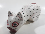 Indonesia Hand Painted White Black Spotted Wooden Carved Cat Sculpture Leaning off Table