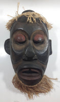 African Style or Indonesian Style Hand Carved Wood Wall Mask With Woven Rope Hair and Beard