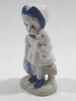 Vintage Blue and White Delft Style Girl Holding Puppy Porcelain Figure 3 3/4" Tall
