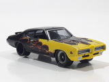 2003 Johnny Lightning 1969 Pontiac GTO Yellow and Black Die Cast Toy Car Vehicle with Opening Hood - Busted Spoiler
