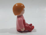 1990 Geobra Playmobil Female Girl Pink Shirt Red Pants Sitting 1 1/2" Tall Toy Figure