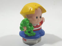 2001 Little People Blonde Hair Red and white Shirt Blue Pants Holding Green Frog 2 1/4" Tall Toy Figure