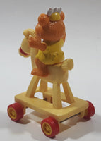 1986 HA! The Muppets Baby Fozzie Bear Character on Rocking Horse PVC Toy Figure