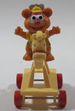 1986 HA! The Muppets Baby Fozzie Bear Character on Rocking Horse PVC Toy Figure