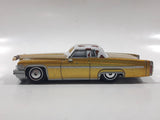 Disney Pixar Cars Cadillac Coupe de Ville Gold with Brown and White Cow Print Roof Die Cast Toy Car Vehicle