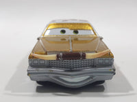 Disney Pixar Cars Cadillac Coupe de Ville Gold with Brown and White Cow Print Roof Die Cast Toy Car Vehicle