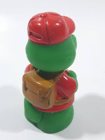 Green Crocodile Character with Red Hat and Brown Backpack 2 3/8" Tall Toy Figure