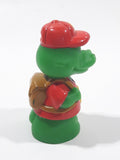 Green Crocodile Character with Red Hat and Brown Backpack 2 3/8" Tall Toy Figure