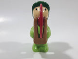 Man wearing Green Holding Red Plastic Saw 3" Tall Plastic Toy Figure