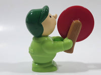 Man wearing Green Holding Red Plastic Saw 3" Tall Plastic Toy Figure