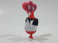 Ferrero Kinder Surprise MPG SE297 Egg Holding Pink Balloons 1 1/2" Tall Toy Figure