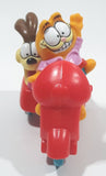 1989 McDonald's Garfield and Odie on a Motorbike Toy Vehicle and Figure