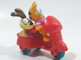 1989 McDonald's Garfield and Odie on a Motorbike Toy Vehicle and Figure