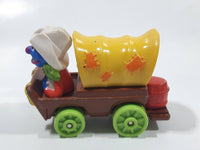 1987 Playskool Muppets Sesame Street Cowboy Grover Chuck Wagon Yellow and Brown Die Cast Toy Car Vehicle