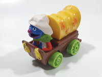 1987 Playskool Muppets Sesame Street Cowboy Grover Chuck Wagon Yellow and Brown Die Cast Toy Car Vehicle