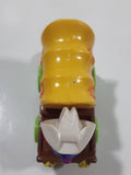 1987 Playskool Muppets Sesame Street Cowboy Grover Chuck Wagon Yellow and Brown Die Cast Toy Car Vehicle