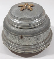 Antique 1935 Flower Embossed Round Aluminium Metal Musical Lidded Powder Box