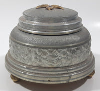 Antique 1935 Flower Embossed Round Aluminium Metal Musical Lidded Powder Box