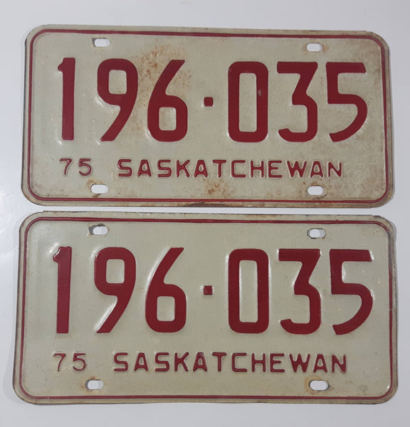 Set of Matching Vintage 1975 Saskatchewan Red Lettering White Vehicle License Plate Metal Tags 196 035