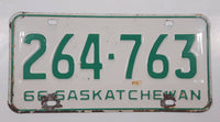 Vintage 1966 Saskatchewan Green Letters White Metal License Plate Tag 264 763