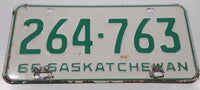 Vintage 1966 Saskatchewan Green Letters White Metal License Plate Tag 264 763