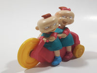 1998 Burger King Rugrats Phil and Lil Character on Bicycle 4" Long Plastic Toy Figure