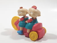 1998 Burger King Rugrats Phil and Lil Character on Bicycle 4" Long Plastic Toy Figure