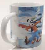 Enesco Disney Mickey Mouse, Minnie Mouse, Goofy, and Pluto Winter Scene Ice Skating on A Pond 3 3/4" Tall Ceramic Coffee Mug Cup