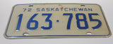 Vintage 1972 Saskatchewan Blue Lettering White Vehicle License Plate Metal Tag 163 785