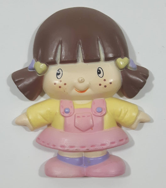 Mangelsen's Miniature Collection Girl in Pink Plastic Fridge Magnet Made in Hong Kong