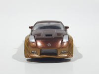 ERTL Joy Ride Universal Studios Fast and Furious Tokyo Drift 2006 Nissan 350Z Gold and Brown Die Cast Toy Car Vehicle Missing Tires 3 1/4" Long