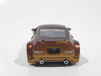 ERTL Joy Ride Universal Studios Fast and Furious Tokyo Drift 2006 Nissan 350Z Gold and Brown Die Cast Toy Car Vehicle Missing Tires 3 1/4" Long
