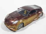ERTL Joy Ride Universal Studios Fast and Furious Tokyo Drift 2006 Nissan 350Z Gold and Brown Die Cast Toy Car Vehicle Missing Tires 3 1/4" Long