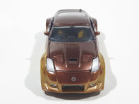 ERTL Joy Ride Universal Studios Fast and Furious Tokyo Drift 2006 Nissan 350Z Gold and Brown Die Cast Toy Car Vehicle Missing Tires 3 1/4" Long