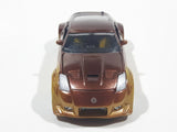 ERTL Joy Ride Universal Studios Fast and Furious Tokyo Drift 2006 Nissan 350Z Gold and Brown Die Cast Toy Car Vehicle Missing Tires 3 1/4" Long