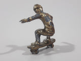 2011 NE-Rom Inc Miniature Silver Skateboarder 1 1/2" Tall Plastic Toy Figure