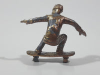 2011 NE-Rom Inc Miniature Silver Skateboarder 1 1/2" Tall Plastic Toy Figure