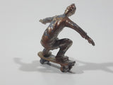 2011 NE-Rom Inc Miniature Silver Skateboarder 1 1/2" Tall Plastic Toy Figure